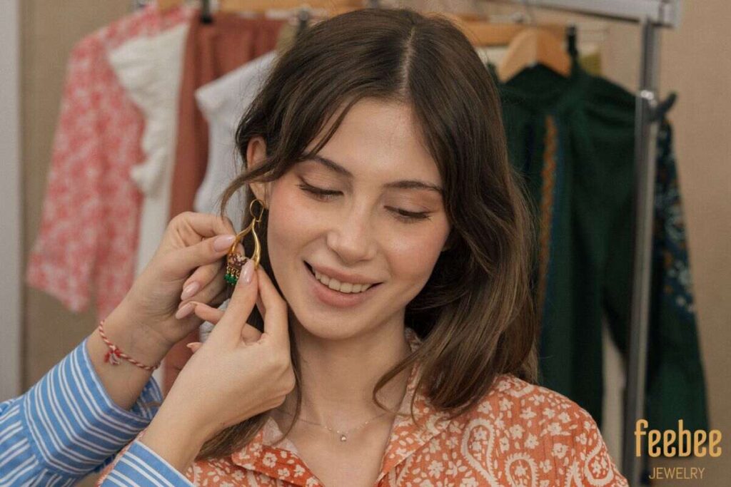 How to Start a Jewelry Business? A Complete Step-by-Step Guide for Beginners 6 Happy customer trying on earrings